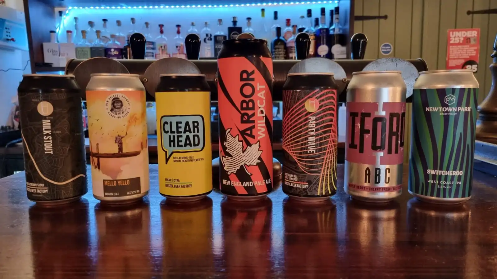 A colourful selection of craft beer cans on the bar at The Butcher’s Hook.